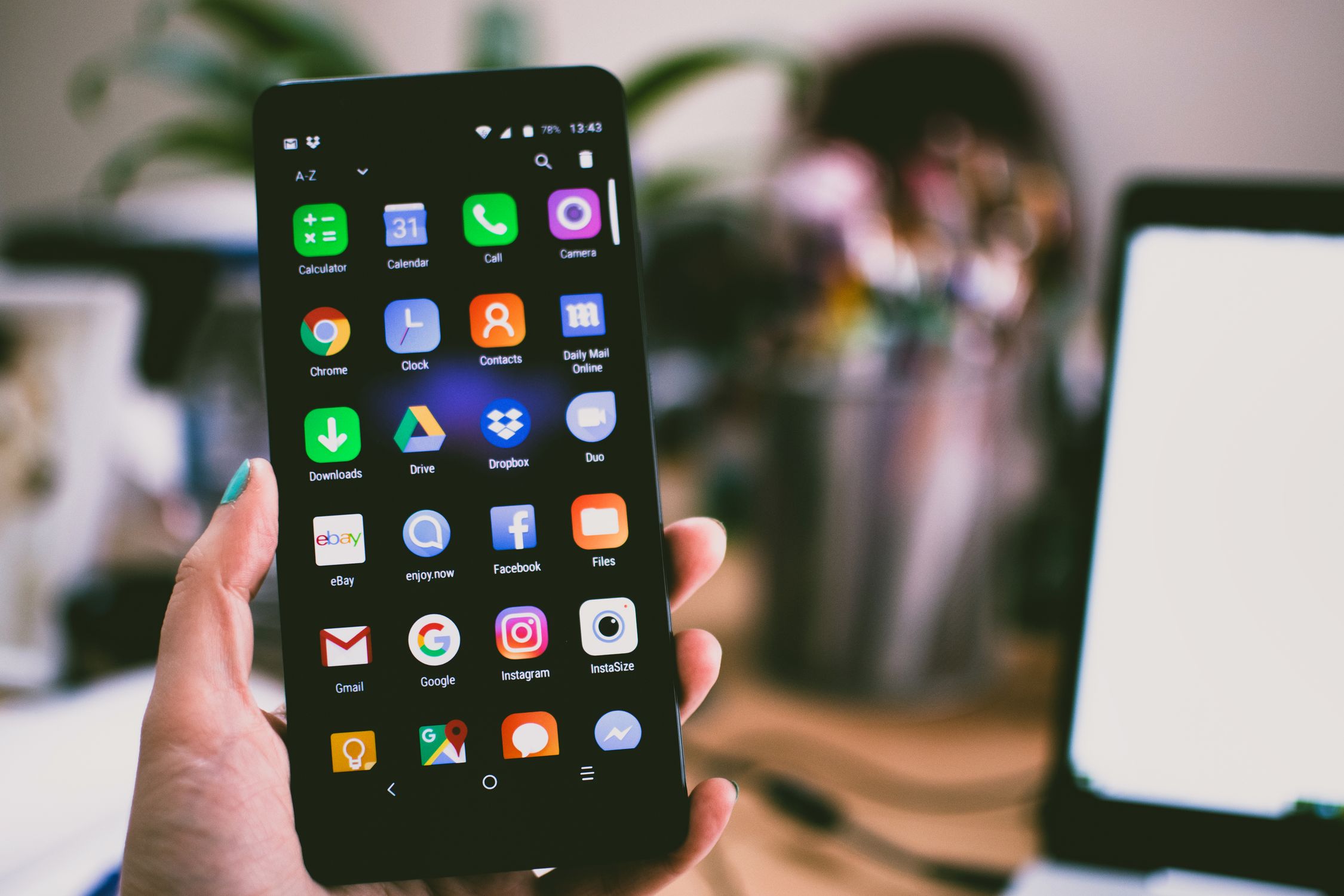 Person creating short-form video content on a smartphone for social media marketing