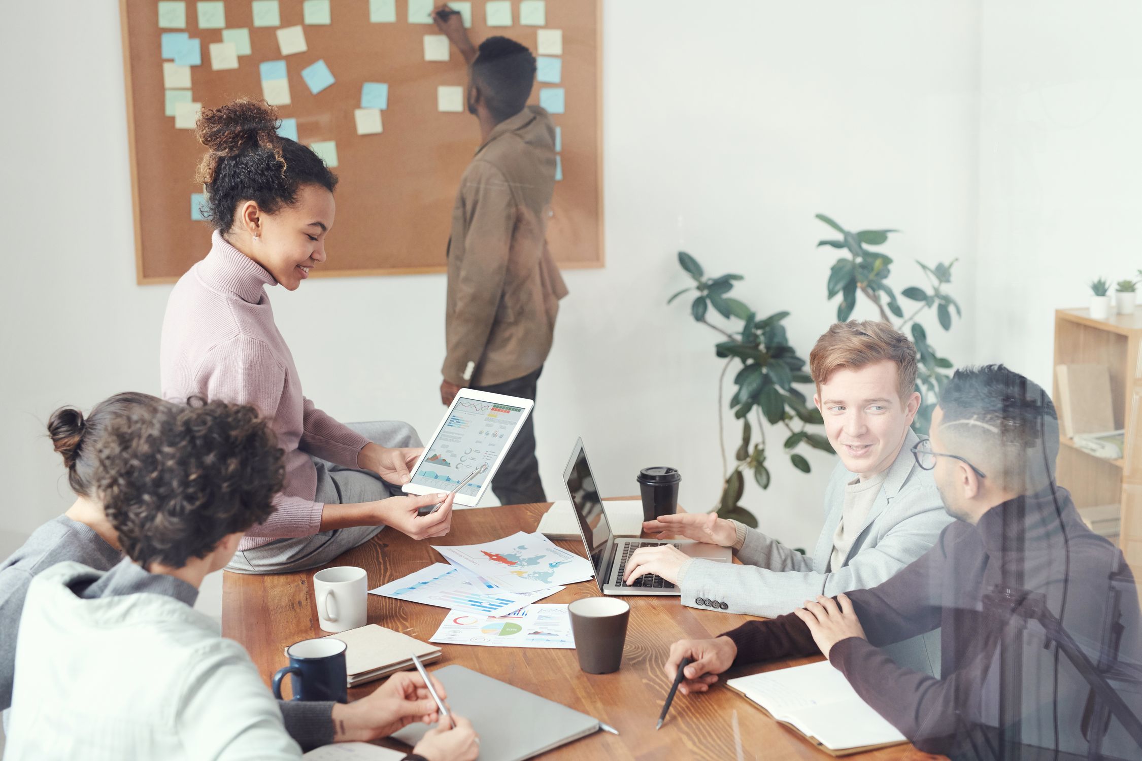 Technical founder reviewing pricing strategy and revenue metrics for a developer tool